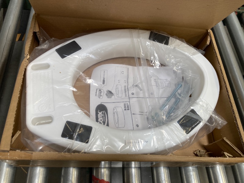 Photo 1 of Carex Toilet Seat Riser, Elongated Raised Toilet Seat Adds 3.5 inches to Toilet Height, for Assistance Bending or Sitting, 300 Pound Weight Capacity Toilet Riser