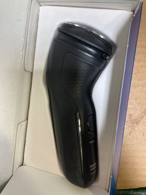 Photo 1 of Philips Norelco Shaver 2400 Series, Wet and Dry Electric Shaver, Pop-up Trimmer, P-Cap, Deep Black, Model X3001/90