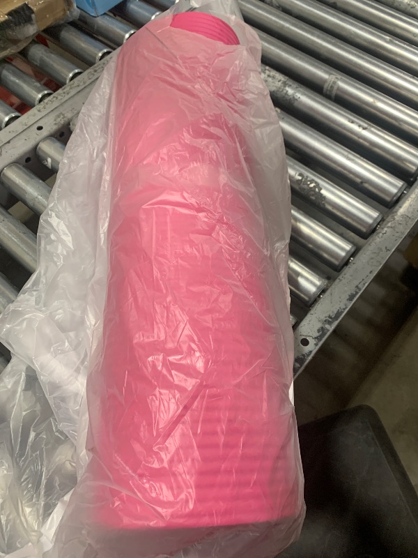 Photo 1 of Amazon Basics 1/2 Inch Extra Thick Exercise Yoga Mat with Carrying Strap, Pink