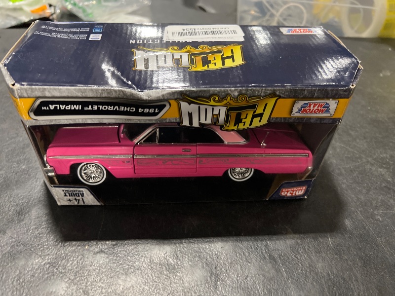 Photo 1 of Toy Cars Chevy Impala Lowrider Hard Top Pink with Graphics and Light Pink Top Get Low Series 1/24 Diecast Model Car by Motormax 79021,Unisex Adult