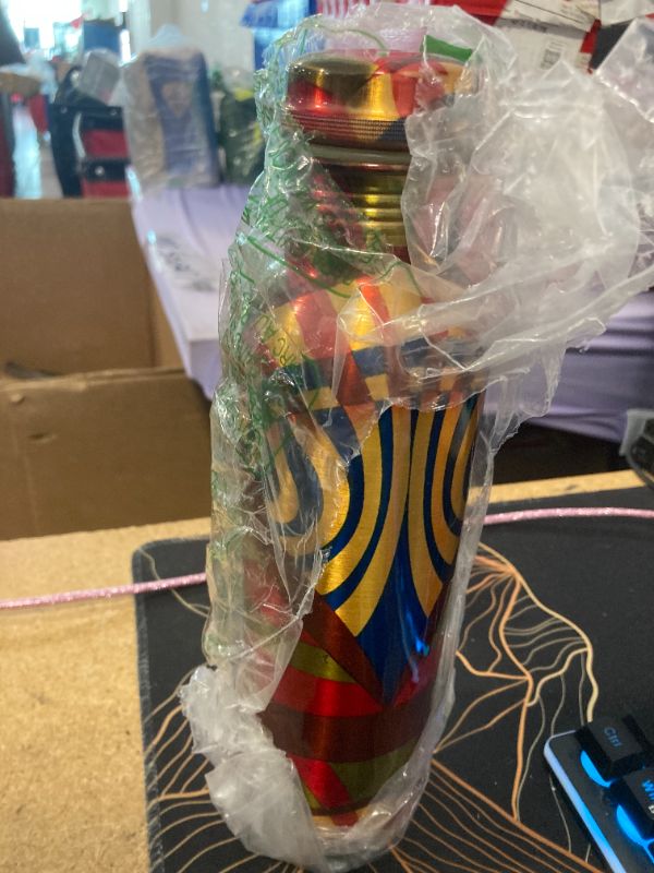 Photo 1 of ***BOTTLE ONLY NO CASE***Hammered Copper Bottle 34oz, Leakproof Ayurvedic Copper Vessel for Yoga, Gym, Sports, Travel & Daily Use & bottle is bent.