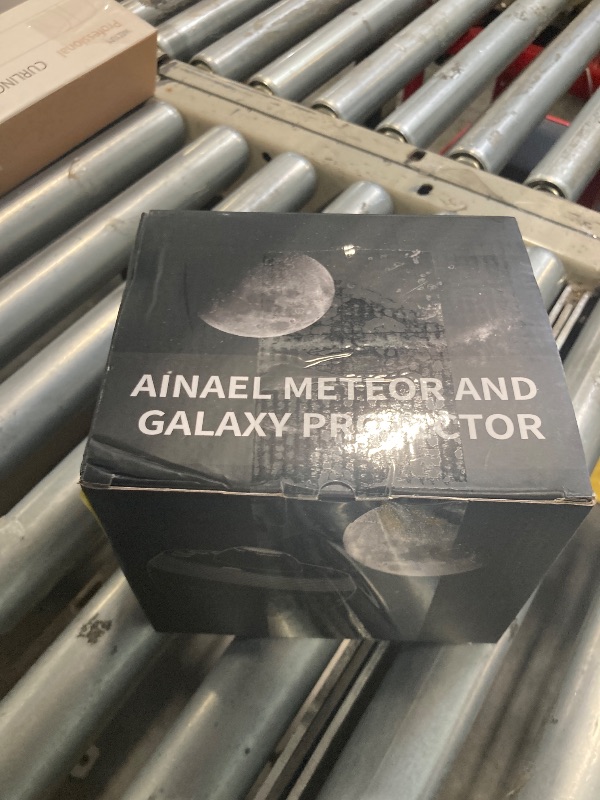 Photo 1 of Ainael Galaxy Projector, Star Projector Planetarium Night Light Lamp Ceiling Space Starry Sky Projector with Light Strip Meteor and Galaxy Projector for Kids Bedroom Birthday Christmas Gift (Black)