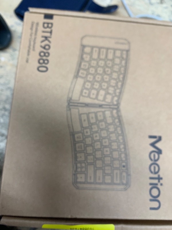 Photo 1 of MEETION Ergonomic Foldable Keyboard, Split Portable Compact Bluetooth Keyboard for Business Travel, Ultra-Thin Folding Rechargeable Wireless Keyboards for iOS Android Windows Mac Tablet PC Smartphone