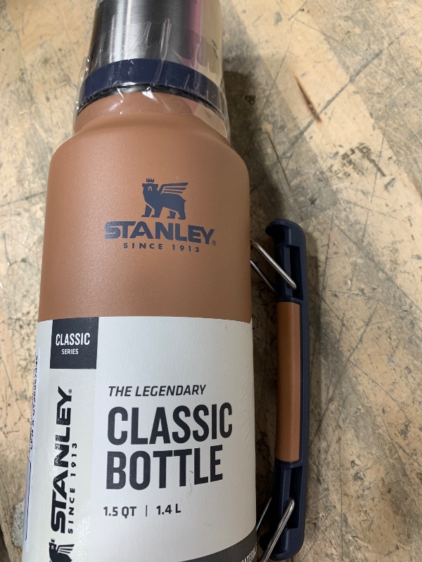 Photo 1 of ***(MINOR DAMAGE/ SEE NOTES)***Stanley Classic Legendary Vacuum Bottle 1.5 qt | Wide Mouth with Leakproof Cup Lid | Keep Drinks Hot or Cold | Packable for Travel | Insulated Stainless Steel Thermal Bottle | BPA-Free | Toast