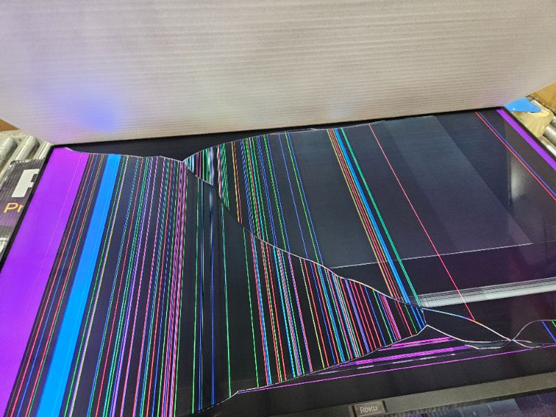 Photo 1 of ** Broken screen, Final sale ** Roku Smart TV – 55-Inch Pro Series 4K QLED RokuTV with Backlit Roku Voice Remote Pro, Dolby Vision IQ, 120Hz Refresh Rate – Live Local News, Sports, Gaming