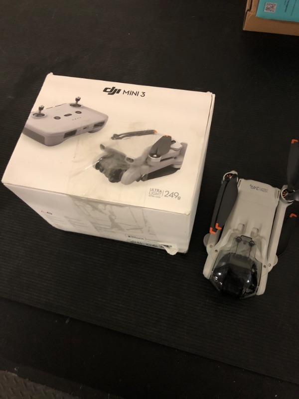 View 2 of DJI Mini 3 - Lightweight and Foldable Mini Camera Drone with 4K HDR Video, 38-min Flight Time, True Vertical Shooting, and Intelligent Features