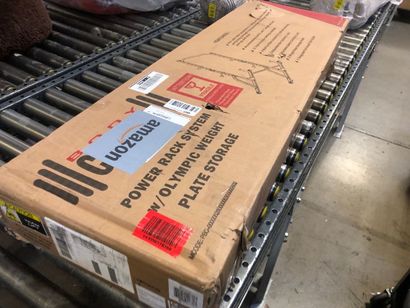 Photo 1 of Body Champ Power Rack System Adjustable Squat Rack Weight and Bar Holder for Home Fitness Equipment with Built in Floor Anchors Stability