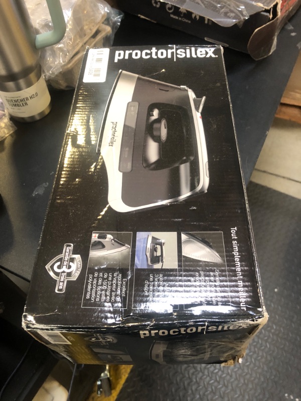 Photo 1 of Proctor Silex Steam Iron for Clothes with Durable Stainless Steel Soleplate, 1500 Watts, 8’ Retractable Cord, 3-Way Auto Shutoff, Anti-Drip, Gray and Black (14250)