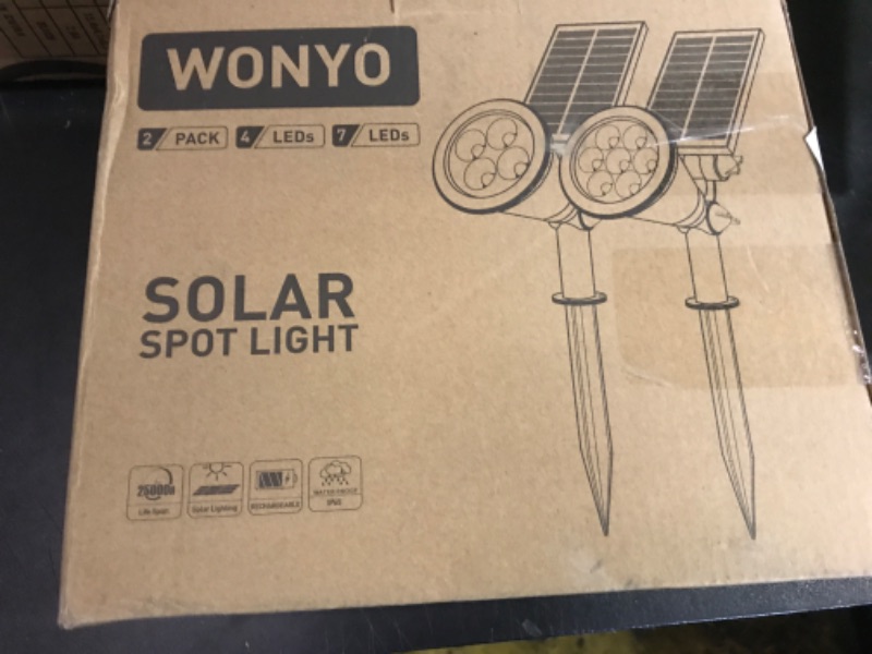 Photo 1 of WONYO Upgraded 7 LED Solar Spot Light, Solar Lights for Outside Waterproof IP65, Auto On/Off Solar Yard Lights, Solar Lights for Tree Garden Christmas Decorations,2 Pack(Warm Light)