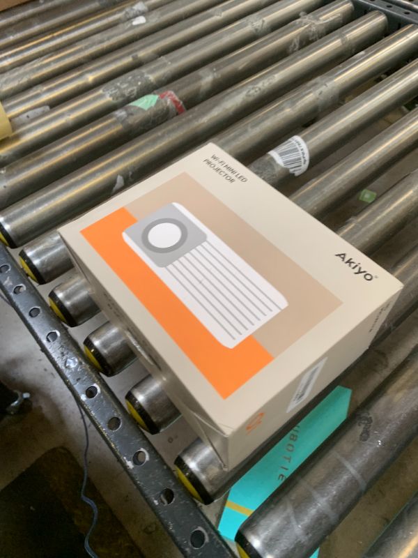 Photo 1 of Mini Projector with WiFi and Bluetooth, 1080P Supported Projector with Projector Stand, Portable Movie Projector for Home Theater/Outdoor, Compatible with iOS/Android/Laptop/TV Stick/HDMI/PS5