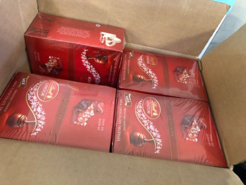 Photo 1 of 12 Boxes of 60pcs each ---exp date  04/30/2025---Lindt LINDOR Milk Chocolate Candy Truffles, Milk Chocolate with Smooth, Melting Truffle Center, 25.4 oz., 