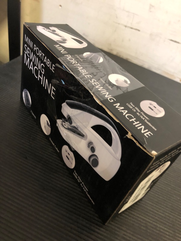 Photo 1 of Handheld Sewing Machine,Two dear,Mini sewing machine,Easy to Use and Fast Stitch Suitable for Clothes,Fabrics, DIY Home Travel Electric Handheld Sewing Machine for Beginner (Grey)