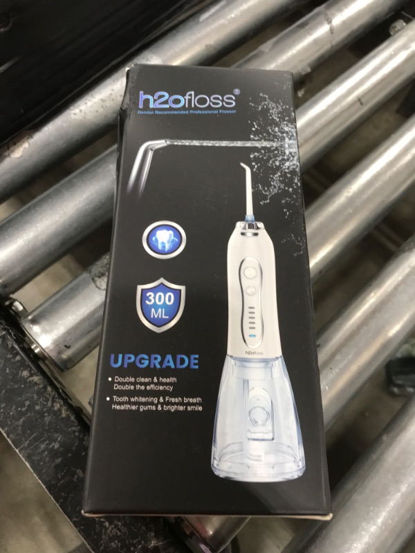 Photo 1 of H2ofloss Water Dental Flosser Teeth Pick -Portable Oral Irrigator with 5 Modes, Rechargeable IPX7 Waterproof Orthodontic Teeth Cleaner Pick Cordless for Home Travel-300ml Water Tank