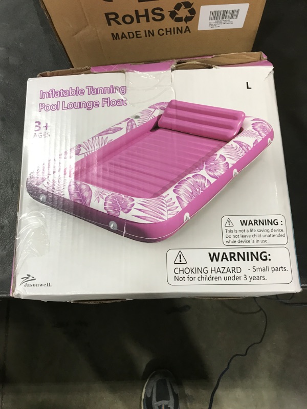 Photo 1 of pink inflatable pool lounge float