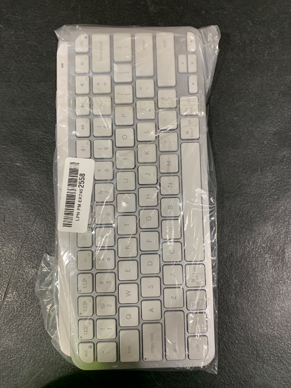 Photo 1 of Logitech MX Keys Mini Minimalist Wireless Illuminated Keyboard, Compact, Bluetooth, Backlit, USB-C, Compatible with Apple macOS, iOS, Windows, Linux, Android, Metal Build - Pale Gray