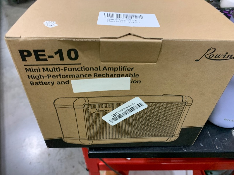 Photo 1 of Rowin PE-10 Electric Guitar Amplifier - 15W Speaker, 6 Preamp Tones, Chorus/Flanger/Phaser/Tremolo, Delay/Echo/Room/Hall, Bluetooth, and Visual Tuner