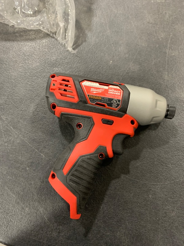 Photo 1 of Milwaukee impact driver 