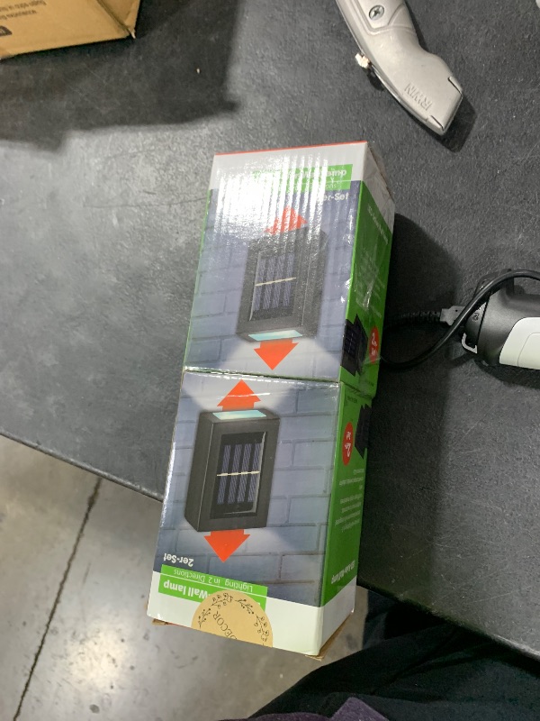 Photo 1 of Solar Wall Lights UP Down 4 Pack,