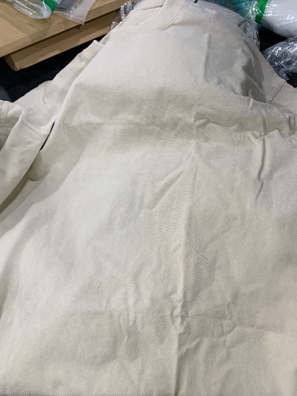 Photo 1 of large pale generic shirt