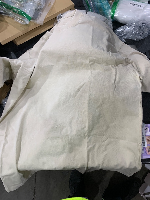 Photo 1 of large pale generic shirt