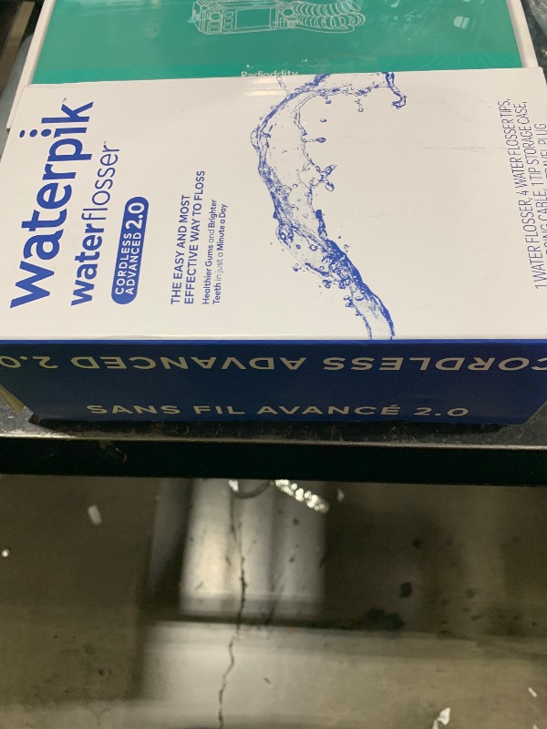 Photo 1 of Waterpik Cordless Advanced 2.0 Water Flosser For Teeth, Gums, Braces, Dental Care With Travel Bag and 4 Tips, ADA Accepted, Rechargeable, Portable, and Waterproof, Blue WP-583, Packaging May Vary