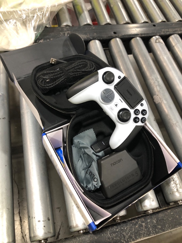 Photo 1 of NACON Revolution 5 Pro Officially Licensed PlayStation Wireless Gaming Controller for PS5 / PS4 / PC - Hall Effect, Trigger Stops, Mappable Buttons, Bluetooth Audio - Triple Black