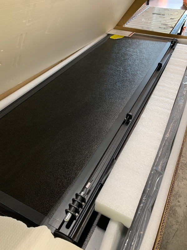 Photo 1 of Rough Country Hard Tri-Fold Tonneau Cover for Chevy Silverado & GMC Sierra 1500/2500HD/3500HD (2014-2019) - Low-Profile Aluminum Truck Bed Cover, Fits 5'9" Bed (69.3-69.9")