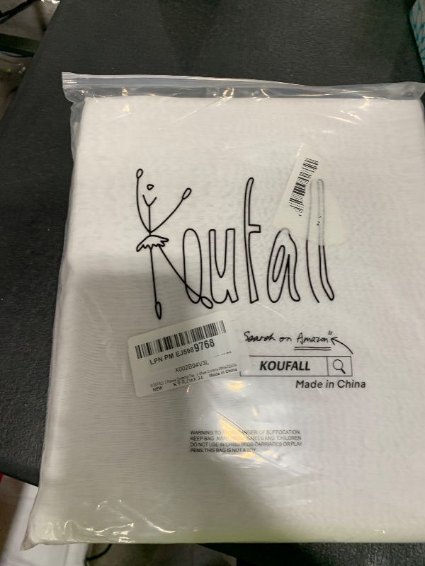 Photo 1 of KOUFALL White Sheer Curtains 63 Inch Length for Bedroom 2 Panels Set Grommet Top Window Voile Drapes Faux Linen Semi Sheer Curtains for Living Room Kids Room Nursery Wide 52x63 Inches Long