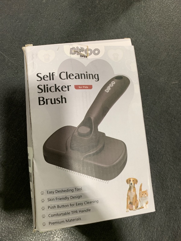 Photo 1 of Dipoo Self Cleaning Shedding Brush - Skin Friendly Grooming Tool for Dogs, Cats, and Puppies, Deshedding and Hair Removal for Long and Short Haired Pets, Black