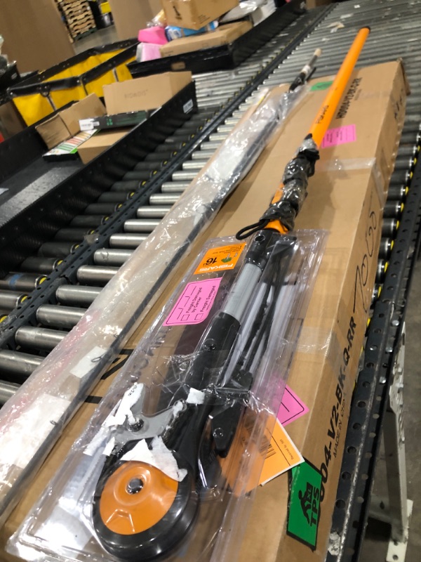 Photo 1 of Fiskars 7-16 ft. Extendable 2-in-1 Pruner and Pole Saw For Tree Trimming, Tree Trimmer with Chain-Drive for Cutting Branches up to 1.25" Diameter with More Power, Garden Tools