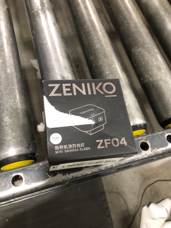 Photo 1 of Zeniko ZF04 Lightweight On-Camera Flash,Mini Flash Speedlite, CCT 6500K±200K,372 Full-Power Flash Light with Universal Hot Shoe Mount Fit for Canon, Nikon, Sony, Fuji,Leica Cameras (Silver)
