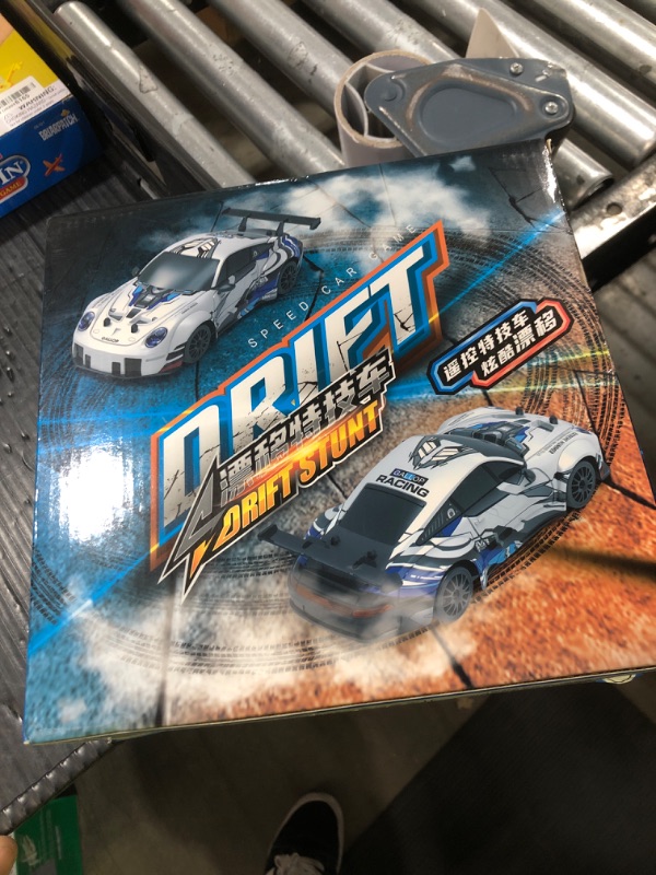 Photo 1 of HTURCCOP RC Drift Car 2.4GHz 1:24 Scale 4WD High Speed Remote Control Cars Vehicle with LED Lights Two Batteries and Drifting Tires Racing Sport Toy Cars for Adults Boys Girls Kids