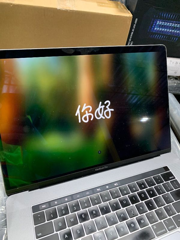 Photo 1 of Apple Mid 2019 MacBook Pro with 2.3 GHz Intel Core i9, 15-inch, 16GB RAM, 512GB SSD Space Gray (Renewed)