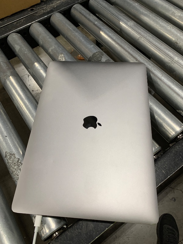 Photo 1 of Apple Mid 2019 MacBook Pro with 2.3 GHz Intel Core i9, 15-inch, 16GB RAM, 512GB SSD Space Gray (Renewed)