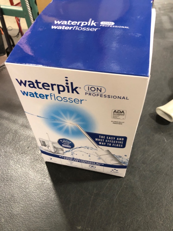 Photo 1 of Waterpik ION Professional Water Flosser, Rechargeable and Portable for Teeth, Gums, Braces, 10 Settings, 7 Flossing Tips For Multiple Users And Needs, ADA Accepted, WF-12 White, Packaging May Vary