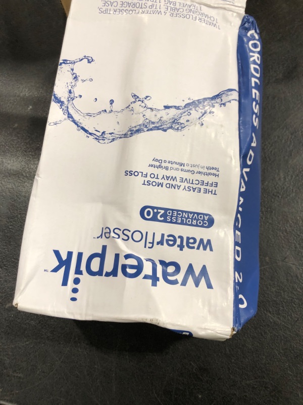 Photo 1 of Waterpik Cordless Advanced 2.0 Water Flosser For Teeth, Gums, Braces, Dental Care With Travel Bag and 4 Tips, ADA Accepted, Rechargeable, Portable, and Waterproof, Gray WP-587, Packaging May Vary