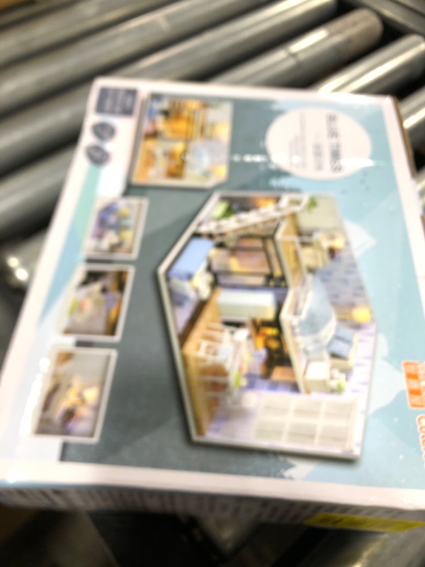 Photo 1 of GuDoQi DIY Miniature Dollhouse Kit, Tiny House kit with Furniture and Music, Miniature House Kit 1:24 Scale, Great Crafts Gift for Birthday Easter Day, Comfortable Life