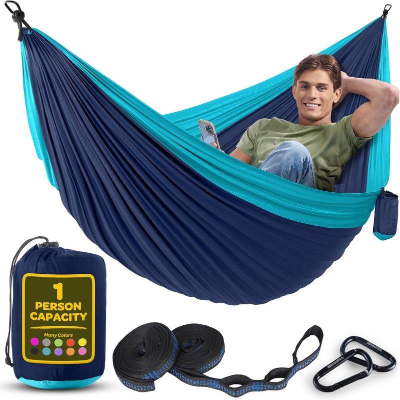 Photo 1 of 
Durable Hammock 400 lb Capacity, Nylon Camping Hammock Chair - Double or Single Sizes w/Tree Straps and Attached Carry Bag - Portable for Travel/Backpacking/Beach/Backyard (Medium, Blue & Light Blue)
