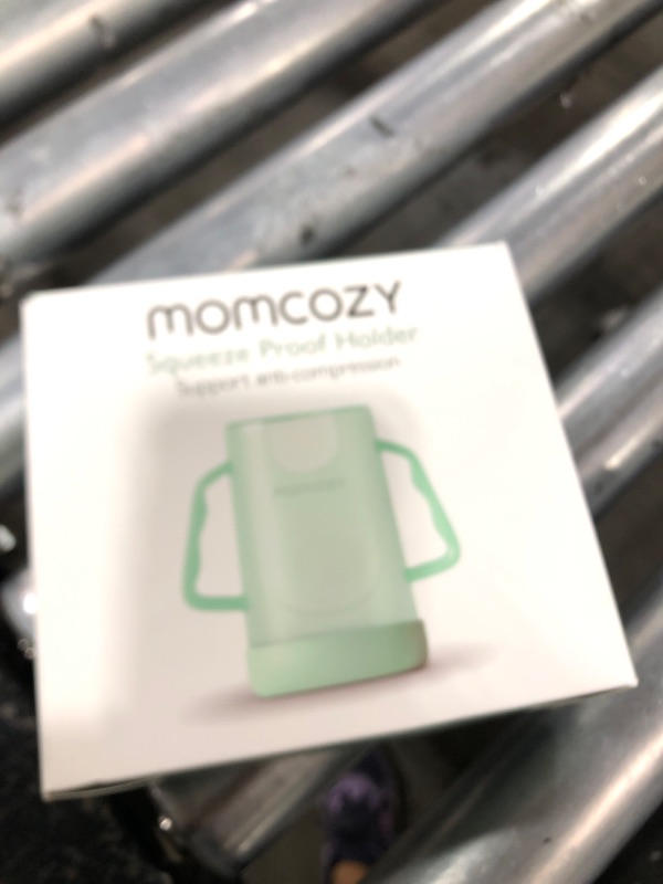 Photo 1 of Momcozy Squeeze Pouch Holder for Food Pouches and Drink Boxes, Baby Pouch Holder Allows Baby to Self-Feed and Avoid Messes, Baby Food Pouch Holder Handle is Easy to Grip, Comfortable, Green