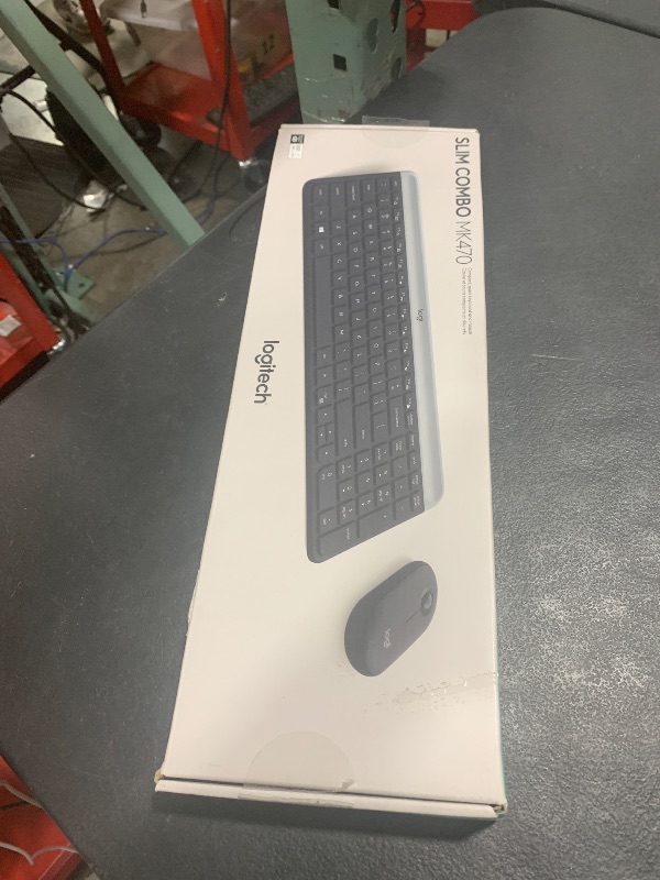 Photo 1 of Logitech MK470 Slim Wireless Keyboard and Mouse Combo - Modern Compact Layout, Ultra Quiet, 2.4 GHz USB Receiver, Plug n' Play Connectivity, Compatible with Windows - Graphite