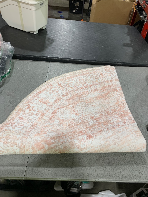 Photo 1 of Round Area Rug (SIZE UNKNOWN)
