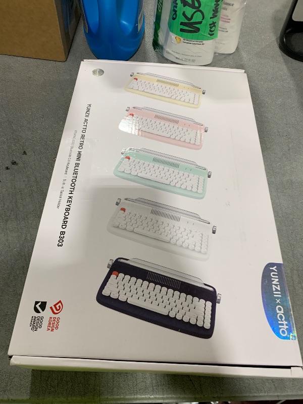 Photo 1 of YUNZII ACTTO B303 Wireless Typewriter Keyboard, Bluetooth Connection, Cute Retro Aesthetic Design with Integrated Stand for Tablet, Phone, PC and Win/Mac/Android(B303, Baby Pink)