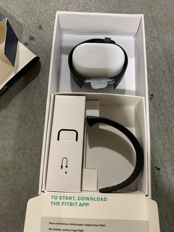 Photo 1 of Fitbit Charge 4 Black Advanced Fitness Tracker