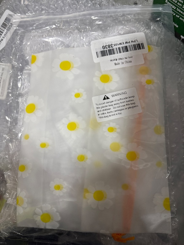 Photo 1 of 200 Pack More Economical Disposable Ear Covers for Shower, Waterproof Plastic Ear Protectors, Ear Shower Caps for Hair Dye