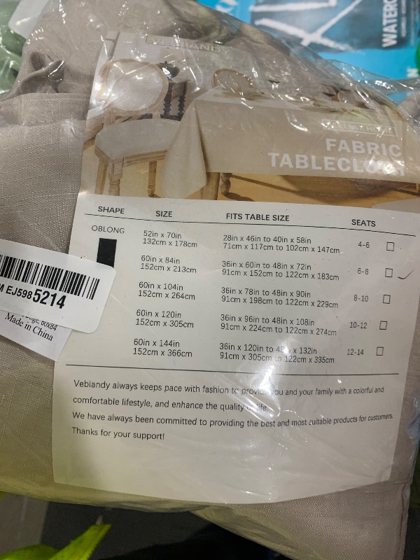 Photo 1 of Veblandy 2 Pack Rectangle Tablecloth, 60x84 inch, Water Resistant Wrinkle Free Linen Textured Table Cloth Washable, Decorative Fabric Table Cover for Dining, Party and Camping, Beige