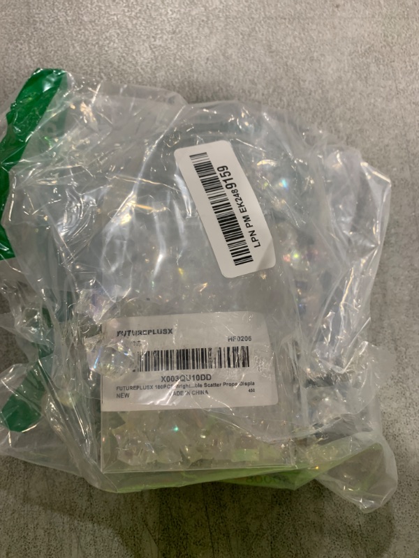 Photo 1 of FUTUREPLUSX 180PCS Clear Fake Ice, Acrylic Decorative Rocks Fake Diamonds Plastic Gems for DIY Crafts Table Scatter Props Display