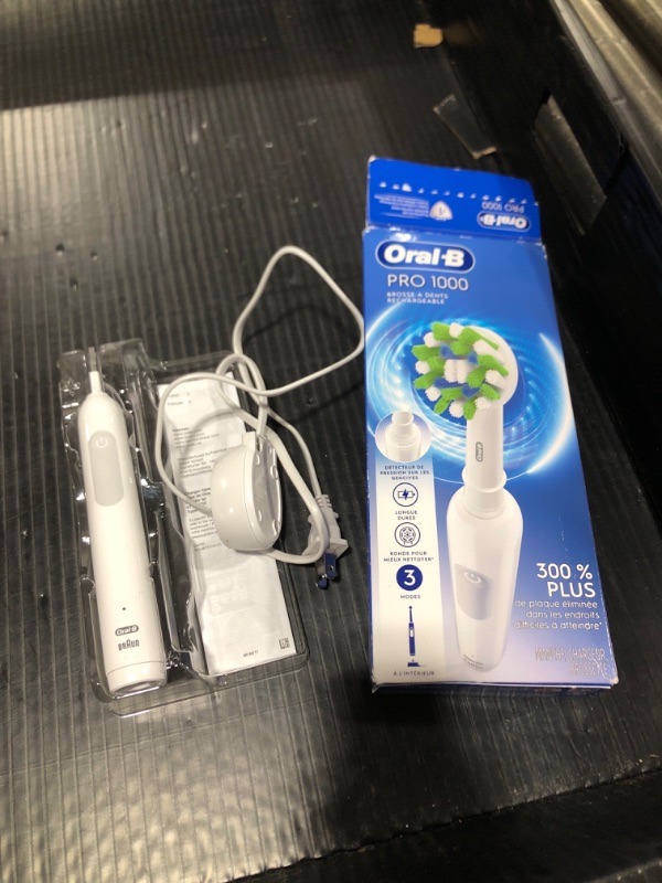 Photo 1 of Oral-B Pro 1000 Rechargeable Electric Toothbrush, White