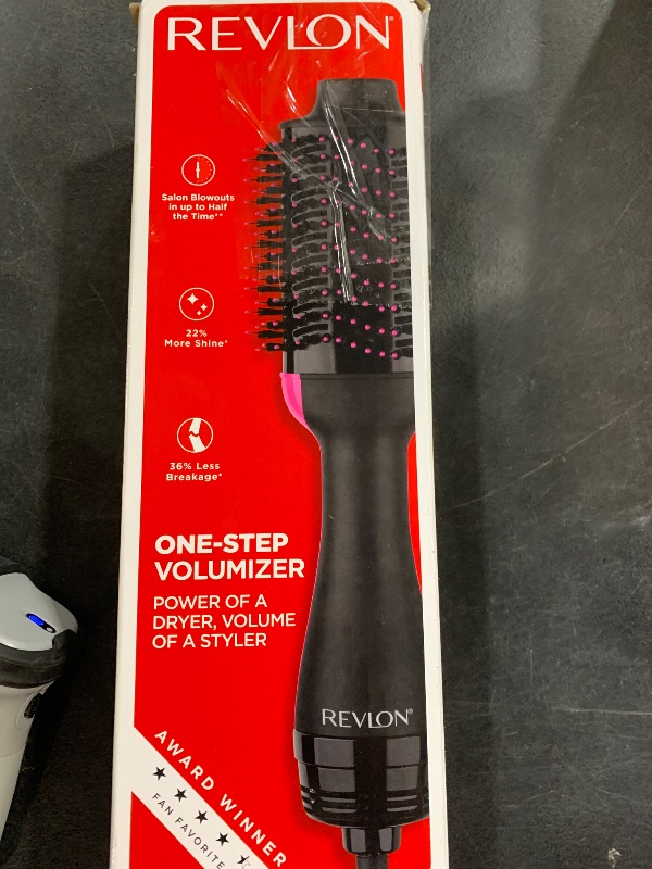 Photo 1 of REVLON One-Step Volumizer Hair Dryer and Styler, Improved Motor for Less Frizz, More Shine, and Reduced Heat Damage for Salon Style Round Brush for Blowout, Black (Amazon Exclusive)