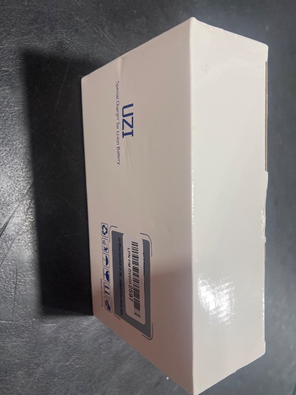 Photo 1 of Uzi 54.6V 2A Charger (with Multiple Output Heads) for Fast and Safe Charging of Your 48V Li-ion Battery-Compatible with Ebike/Electric Scooter (Built-in Fan Cooling System)
