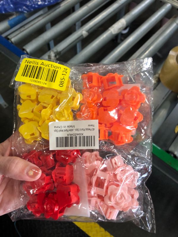 Photo 1 of 40 Pieces Plant Clips for Climbing Plants, Multi-Colored Rose Shaped Plant Climbing Wall Clips, Self-Adhesive Invisible Plant Wall Clips